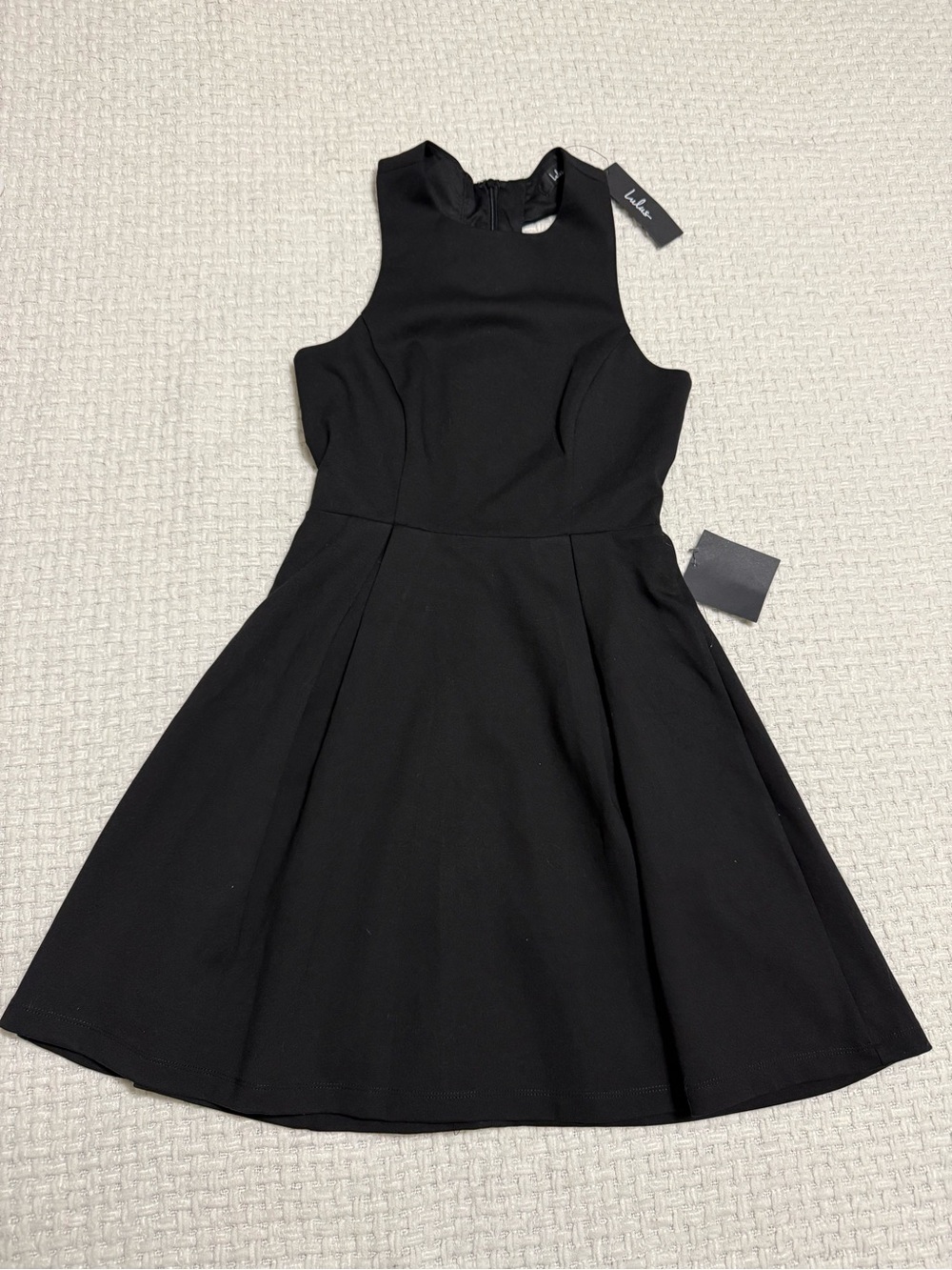 Lulus black dress with cut out back details, Size XS.  NEW WITH TAGS.